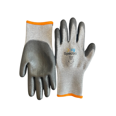 Women's Rockette work gloves showing grey coated palms, knit backs and orange cuff trim